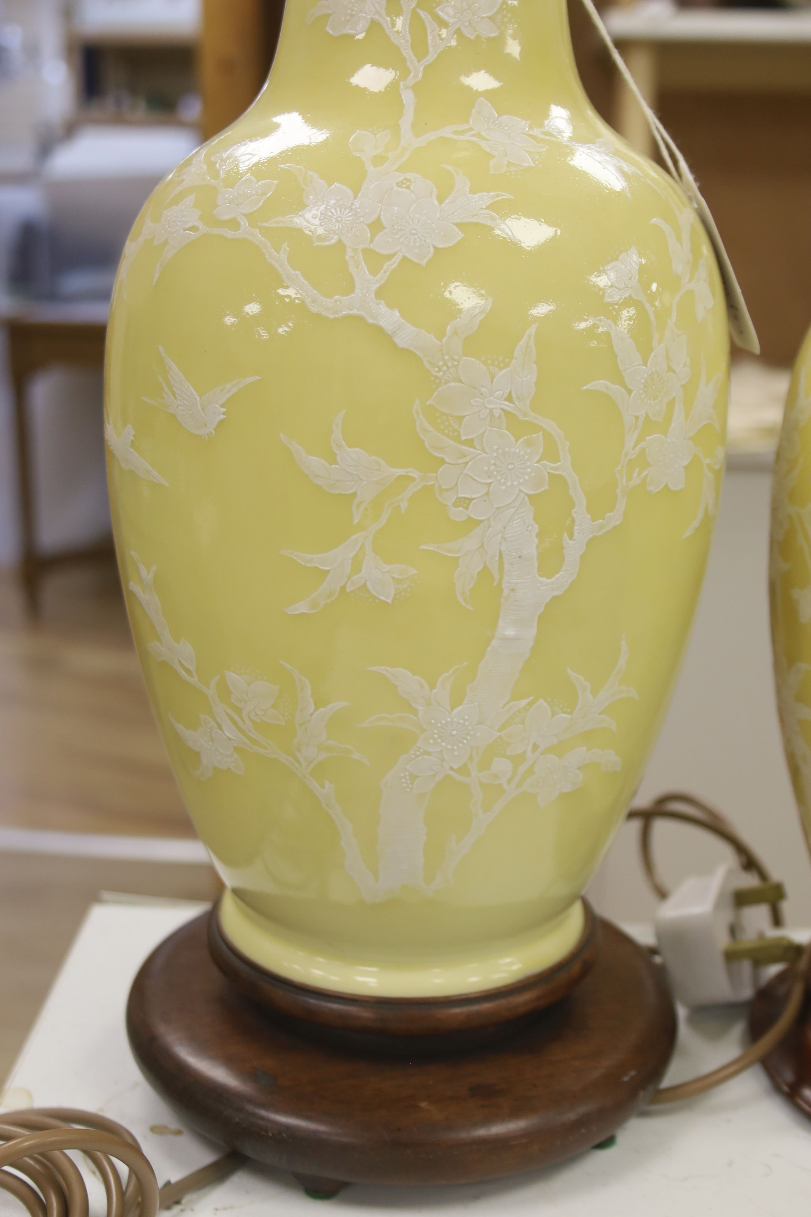 A pair of Chinese yellow ground table lamps, height 38cm not including electric fitting